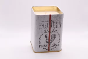 Rose and Rhubarb scented candle in distressed vintage-style tin